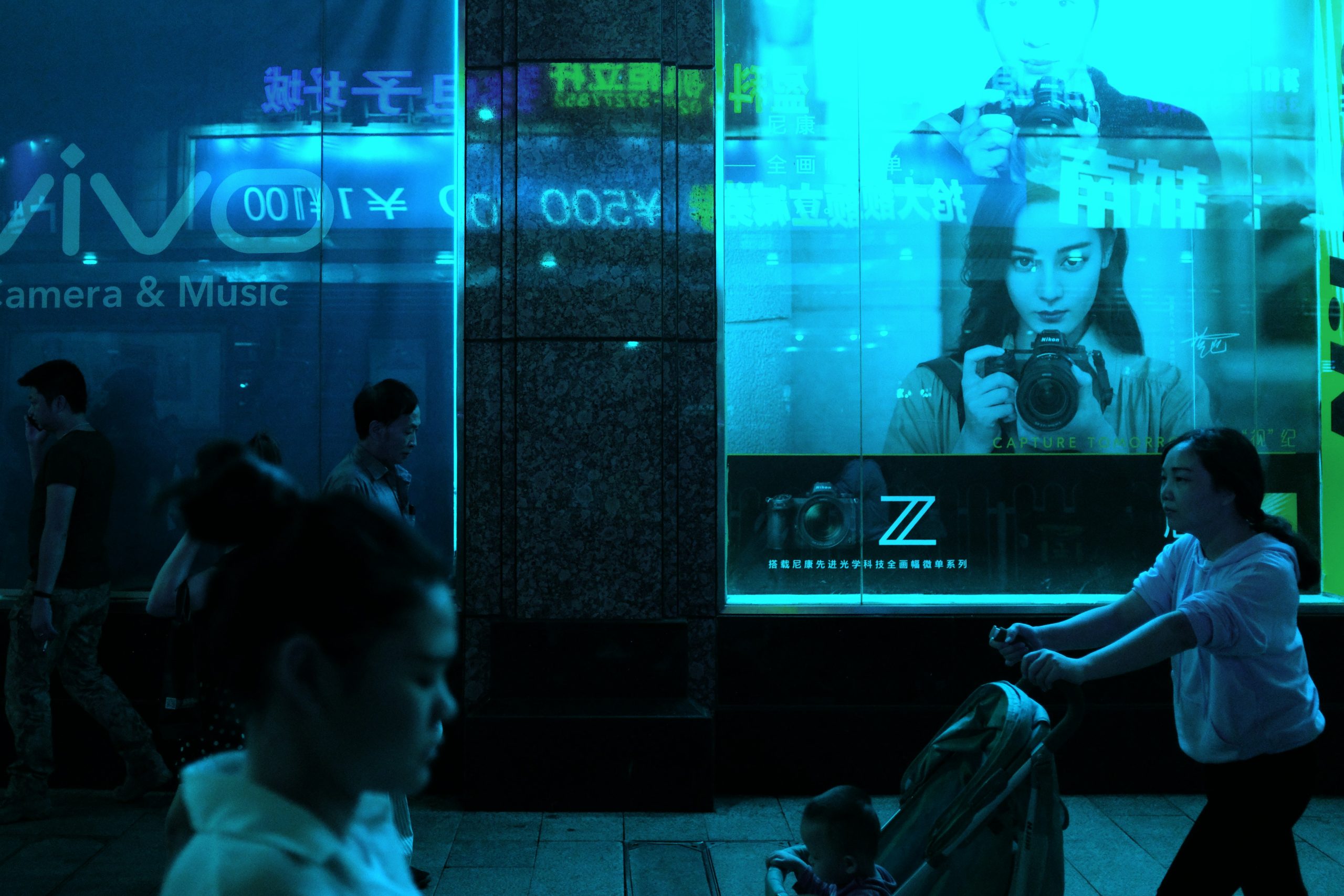 Office workers collaborating with AI analytics tools and augmented reality